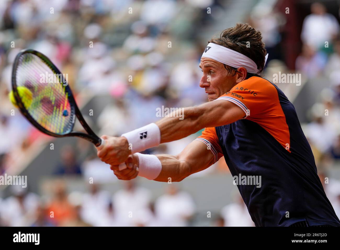 Norways Casper Ruud plays a shot against Serbias Novak Djokovic during the mens singles final match of the French Open tennis tournament at the Roland Garros stadium in Paris, Sunday, June 11,