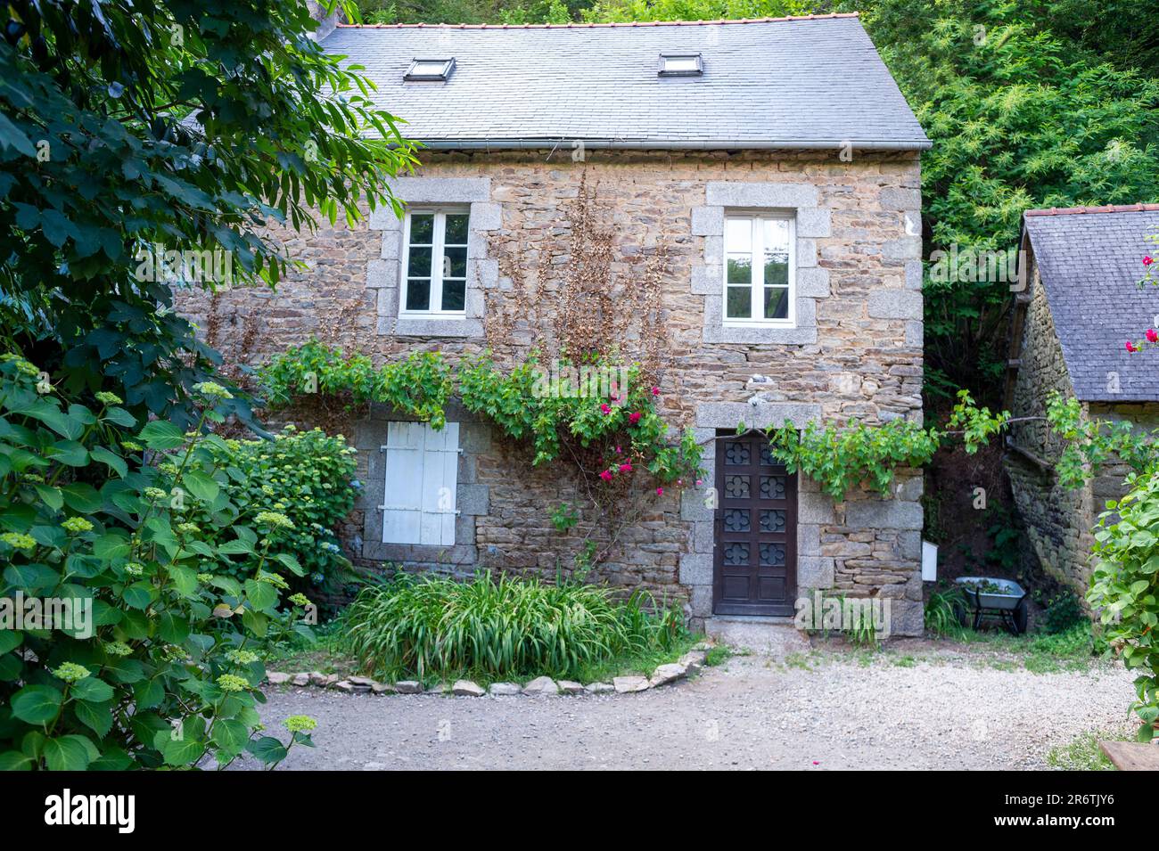 Typical Breton house, Pont-Aven, Brittany, France. Small Breton granite house. The window frames are made of fine cut stone. Stock Photo