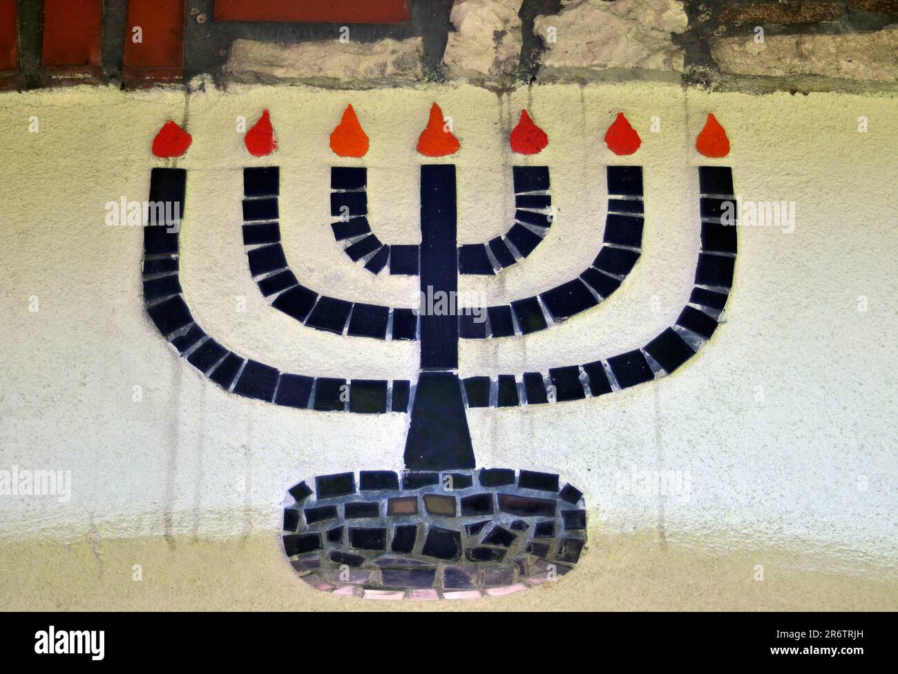 Mosaic of a menorah, seven-branched candlestick, in parish church St. Barbara, designed by Friedensreich Hundertwasser, Baernbach, Styria, Austria Stock Photo
