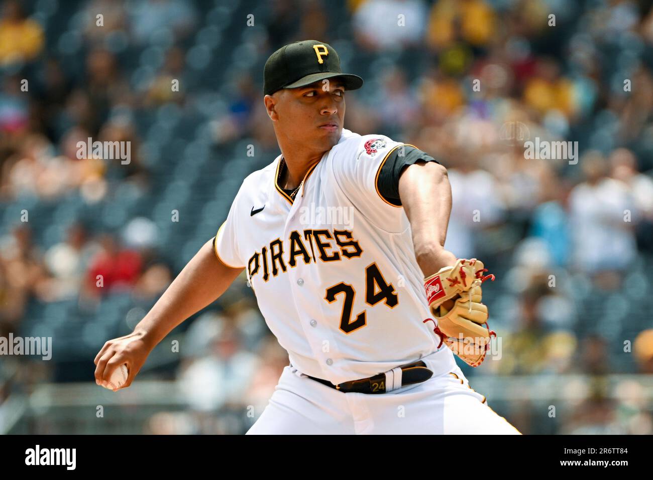 Pittsburgh Pirates starting pitcher Johan Oviedo (24) delivers against the  Texas Rangers in the fourth inning of a baseball game, Wednesday, May 24,  in Pittsburgh. Texas Rangers won 3-2. (AP Photo/Barry Reeger