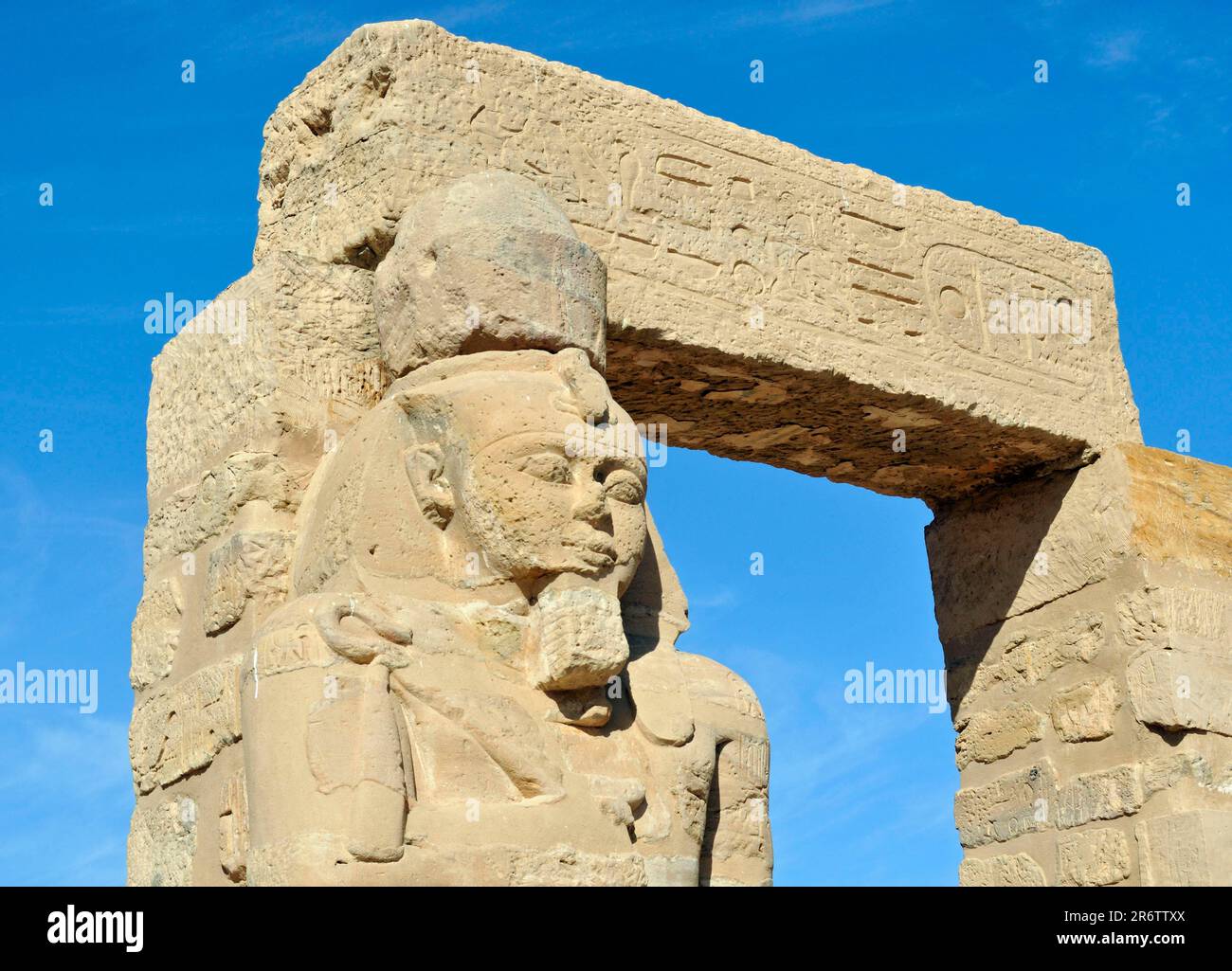 Statue of Ramses II the Great, courtyard, ancient Nubian Gerf Hussein Temple, Kalabsha Island, near Aswan Dam, Lake Nasser, Egypt Stock Photo