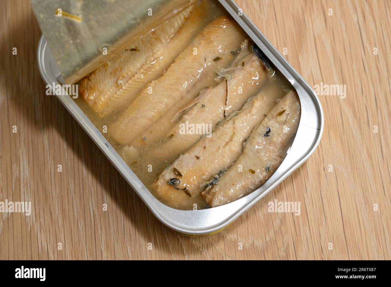 Canned or Tinned Sardine in Olive Oil or French Fish Preserve Stock Photo