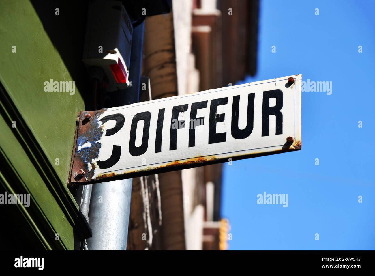 Old Hairdresser sign in French - Honfleur, Calvados, Normandie - France Stock Photo