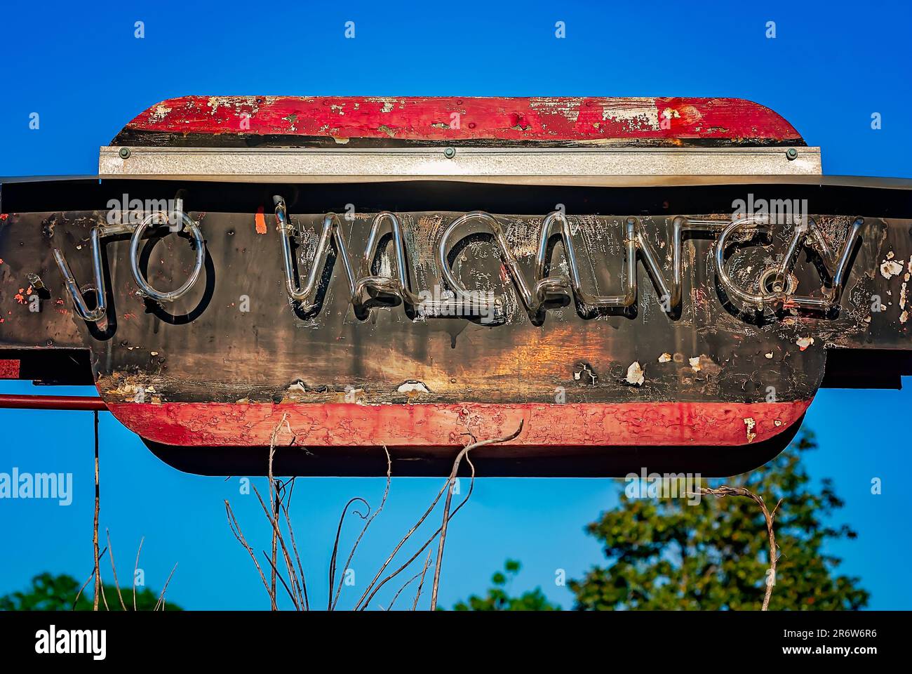 A neon no vacancy sign is pictured at the abandoned Ann Lee Motel, April 21, 2010, in Columbus, Mississippi. The budget motel was demolished in 2019. Stock Photo