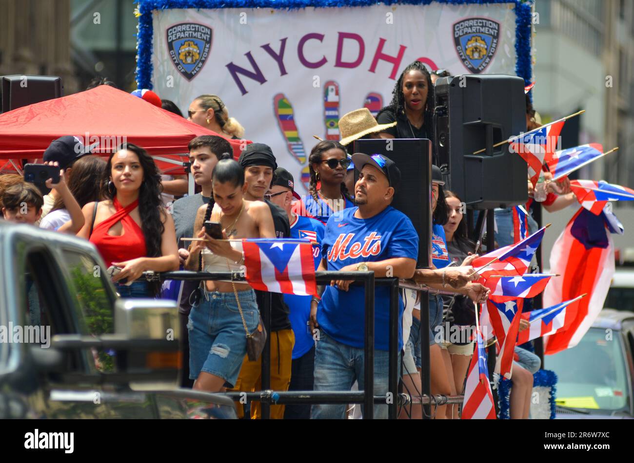 New York City, United States. 11th June, 2023. NYC Correction Department float with flags through Fifth Avenue, New York City during the 66th annual Puerto Rican Day Parade. Credit: Ryan Rahman/Alamy Live News Stock Photo