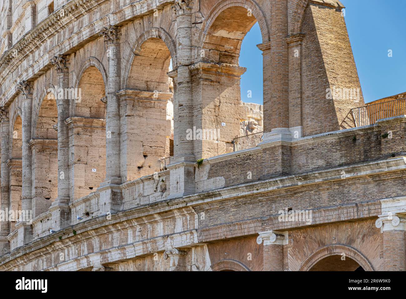 Close up of The Colosseum wall and arches in the centre of Rome, the