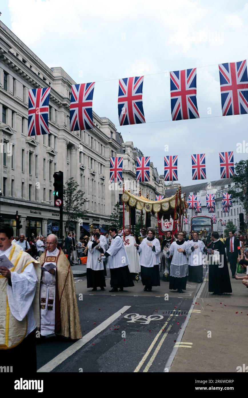 London, 11th June, 2023. The annual Corpus Christi procession takes place in Central London, in a route starting in Soho, processing up Regents Street, along Oxford and Bond Street and ending near Selfridges. Stock Photo