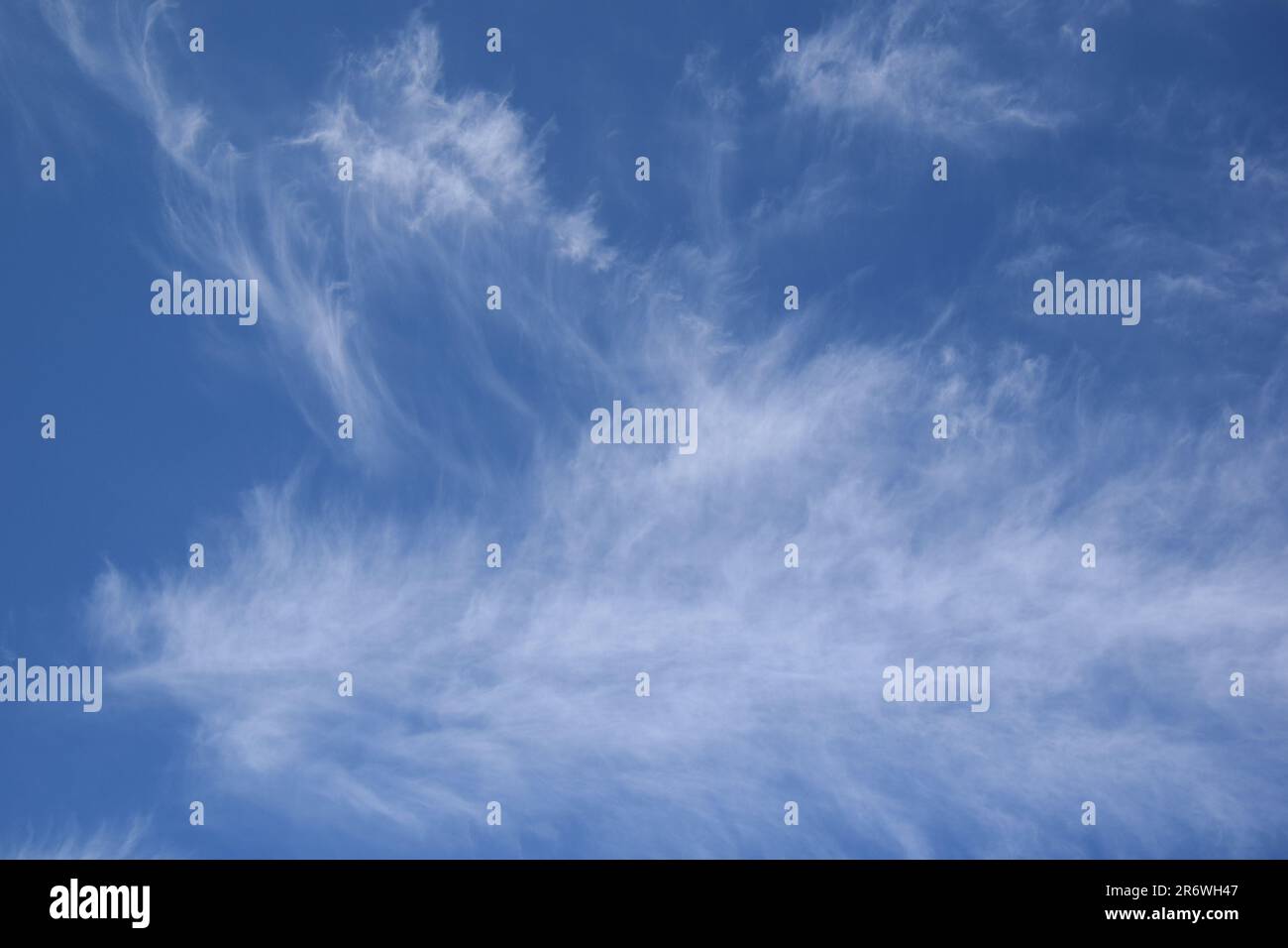 sun in the sky with clouds Stock Photo