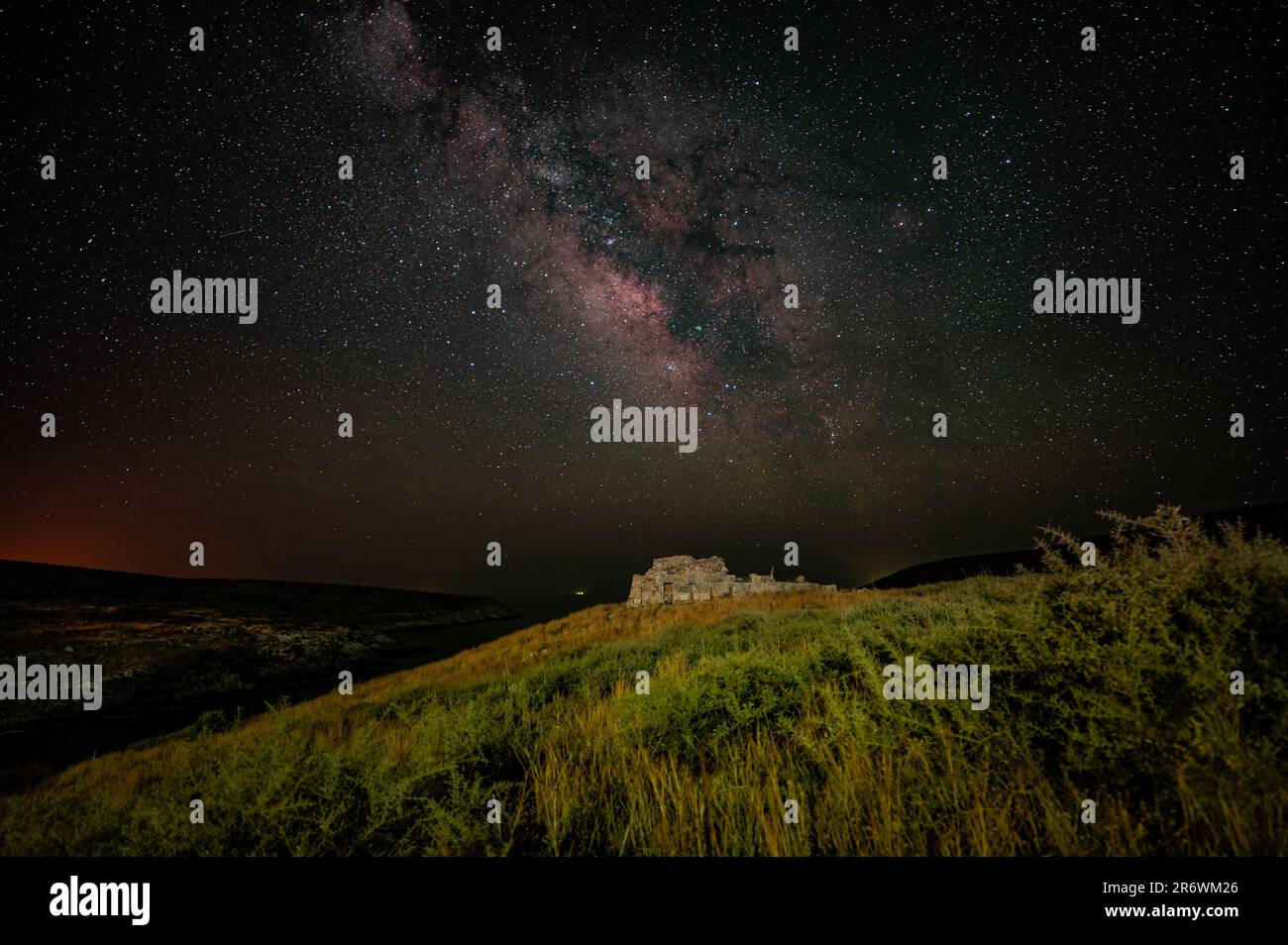 Milky Way in the night sky above the Temple of Poseidon at the southern ...