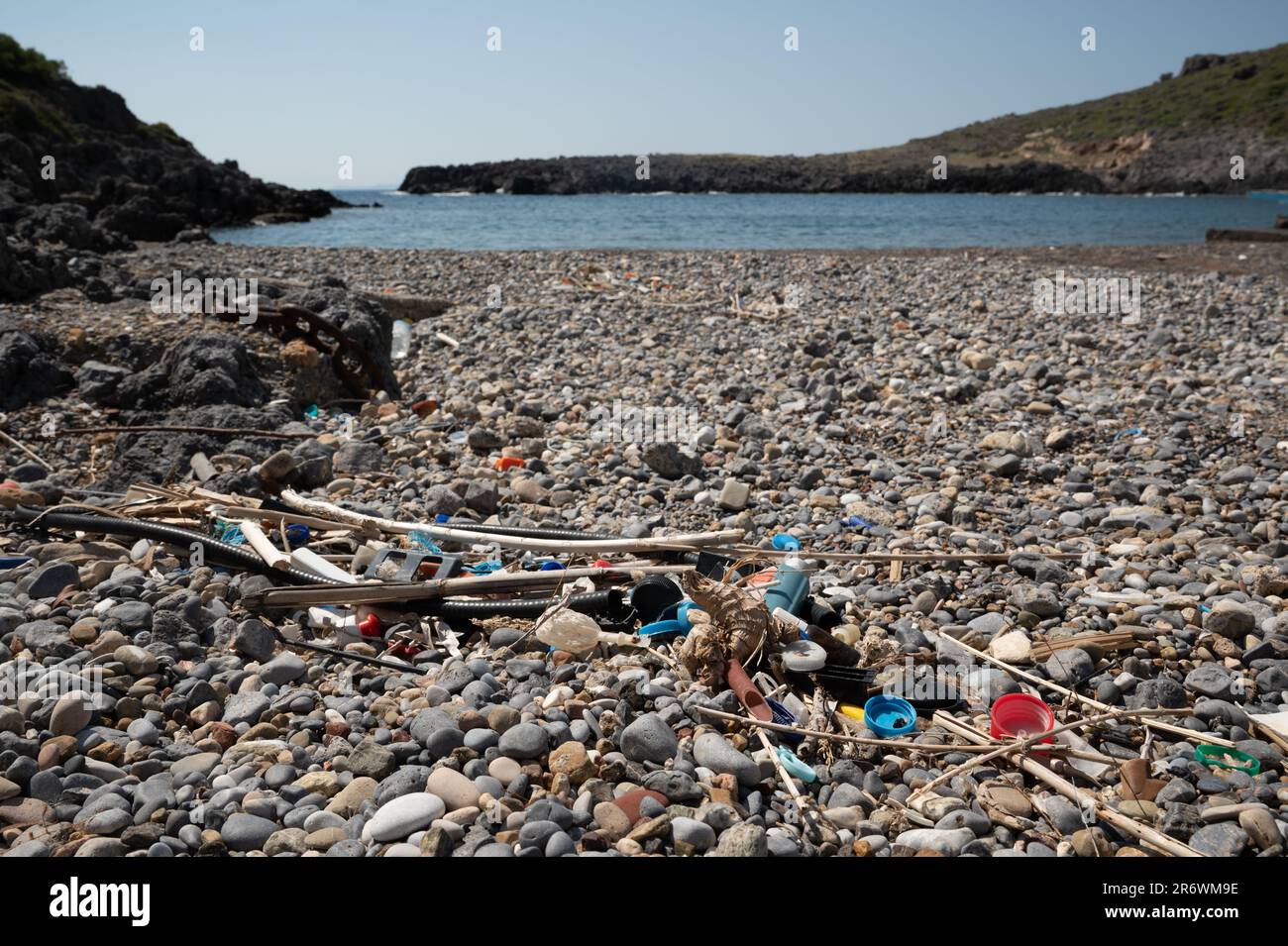 Washed up plastic waste (ocean plastic) on a beach polluting the oceans Stock Photo