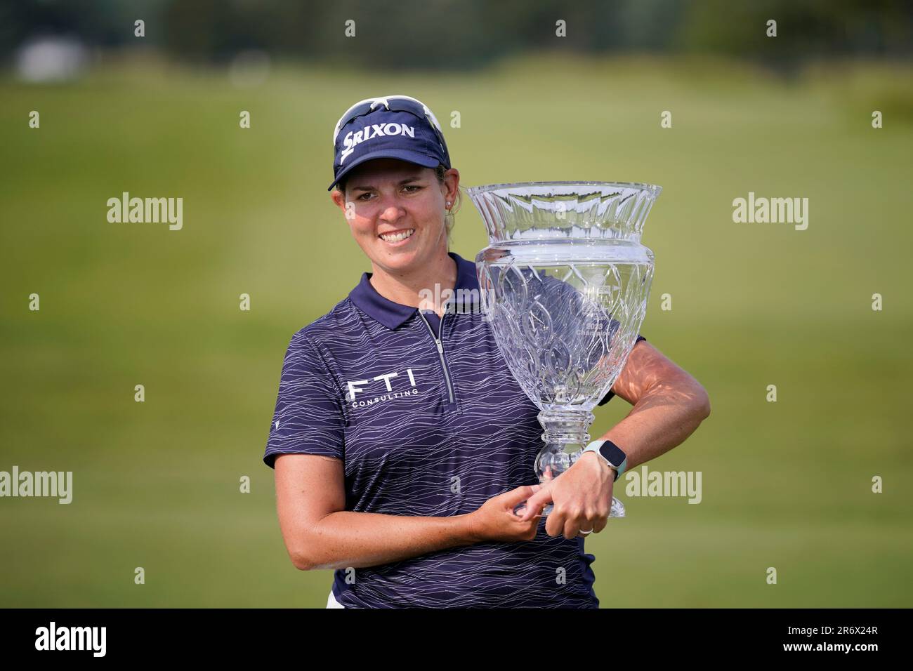 Ashleigh Buhai, of South Africa, poses with the trophy after winning the ShopRite LPGA Classic