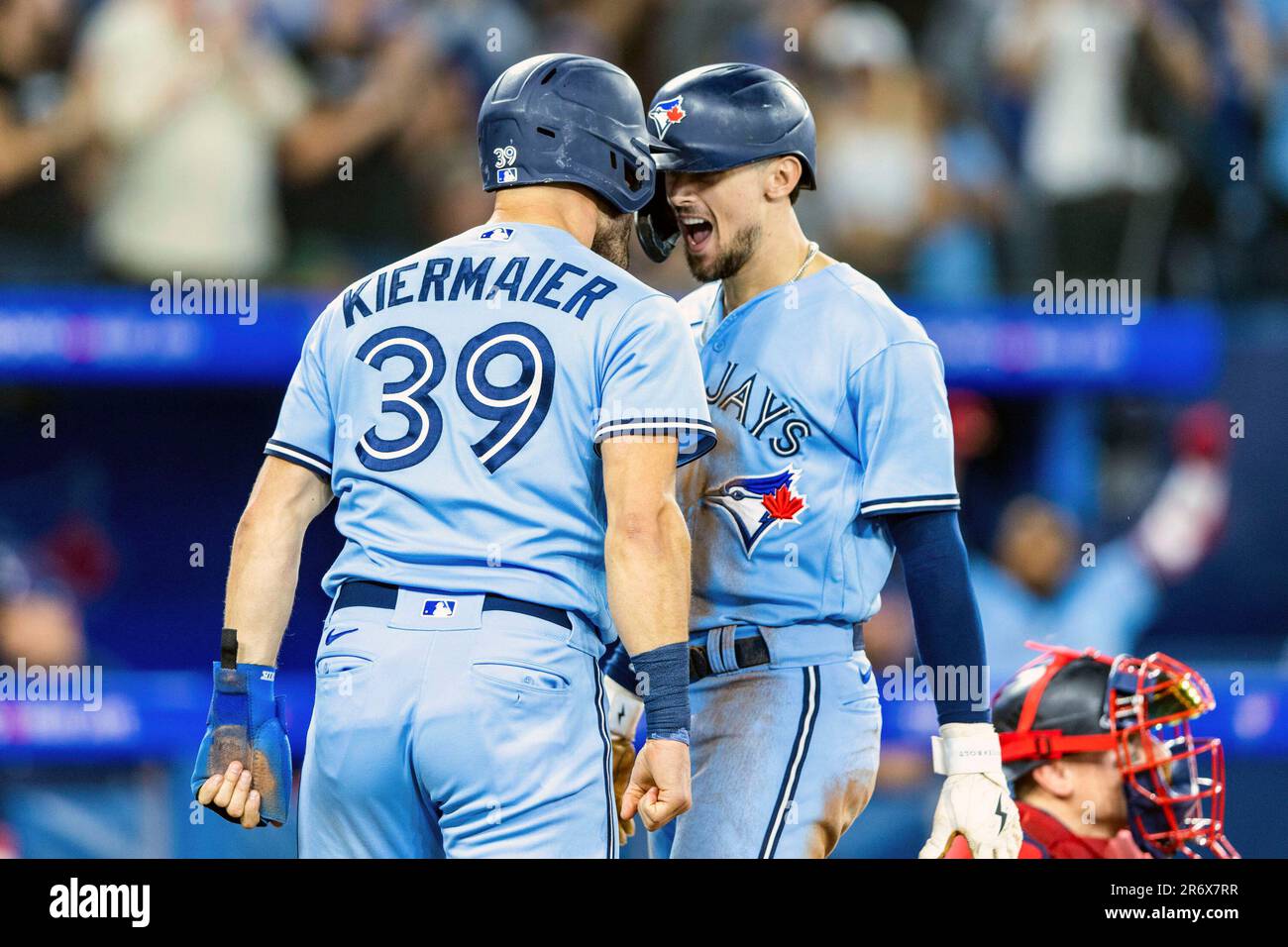 Toronto Blue Jays' Kevin Kiermaier (39) celebrates with teammate Cavan  Biggio after Biggio's three-run home run against the Minnesota Twins during  eighth-inning baseball game action in Toronto, Sunday, June 11, 2023.  (Mathew