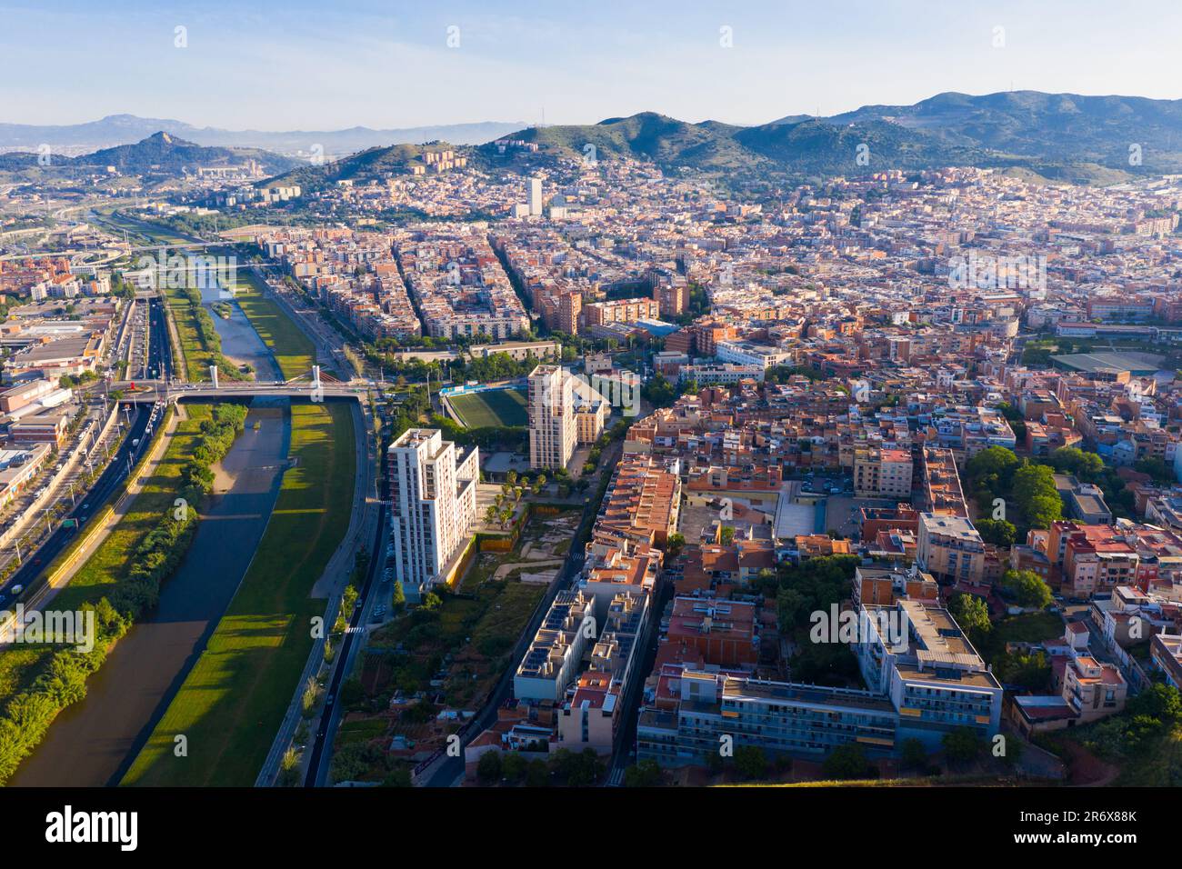 Santa Coloma de Gramenet with a apartment buildings and Besos river Stock Photo