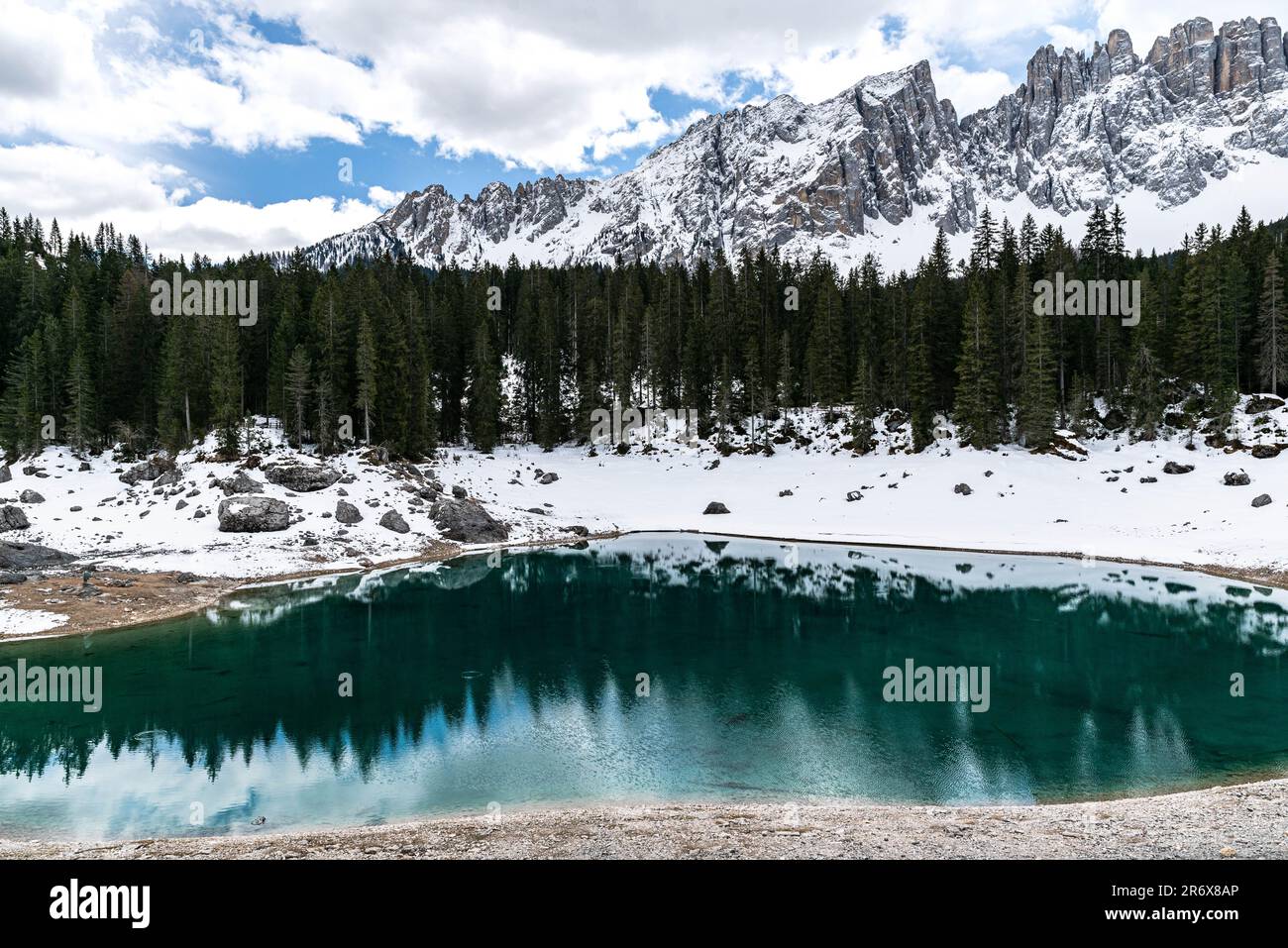 popular hiking spot around schlern-rosengarten - the crystal clear Karersee lake Stock Photo