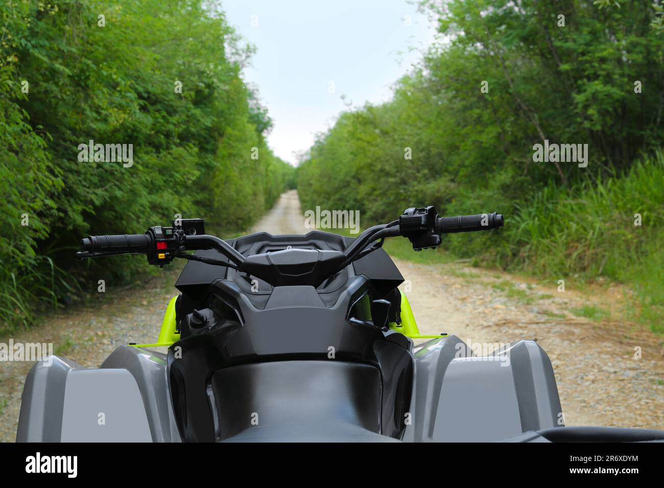 Beautiful quad bike on pathway near trees outdoors Stock Photo Alamy