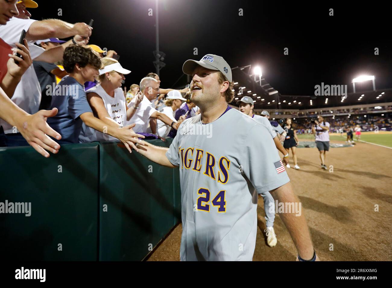 LSU first baseman Cade Beloso celebrates with fans after their team