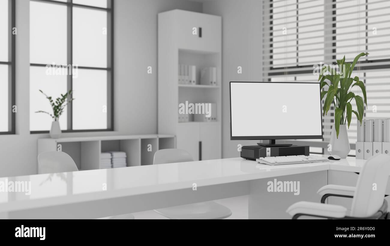 Interior design of a modern white office with computer blank screen