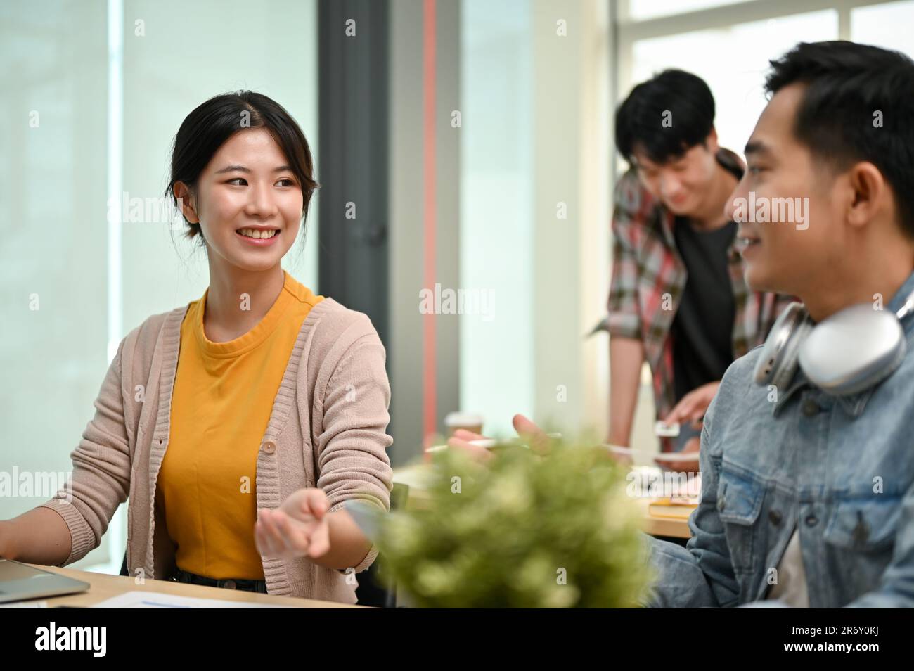 Happy asian male creative talking hi-res stock photography and images ...