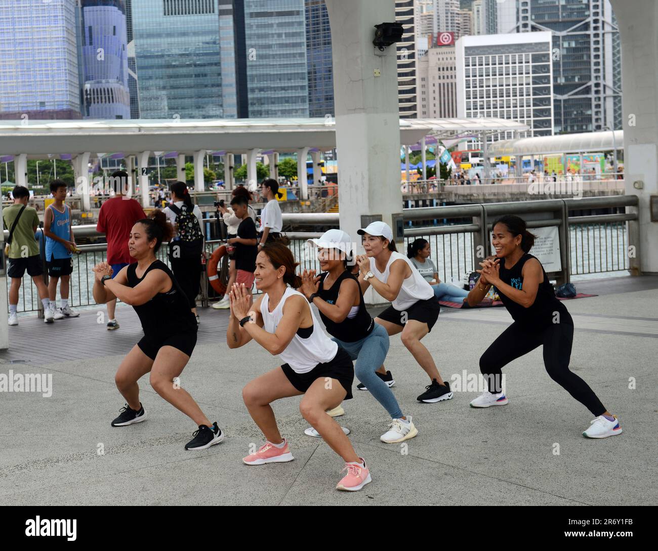 Pinoy domestic helpers practicing a dance on their Sunday holiday. Hong Kong. Stock Photo