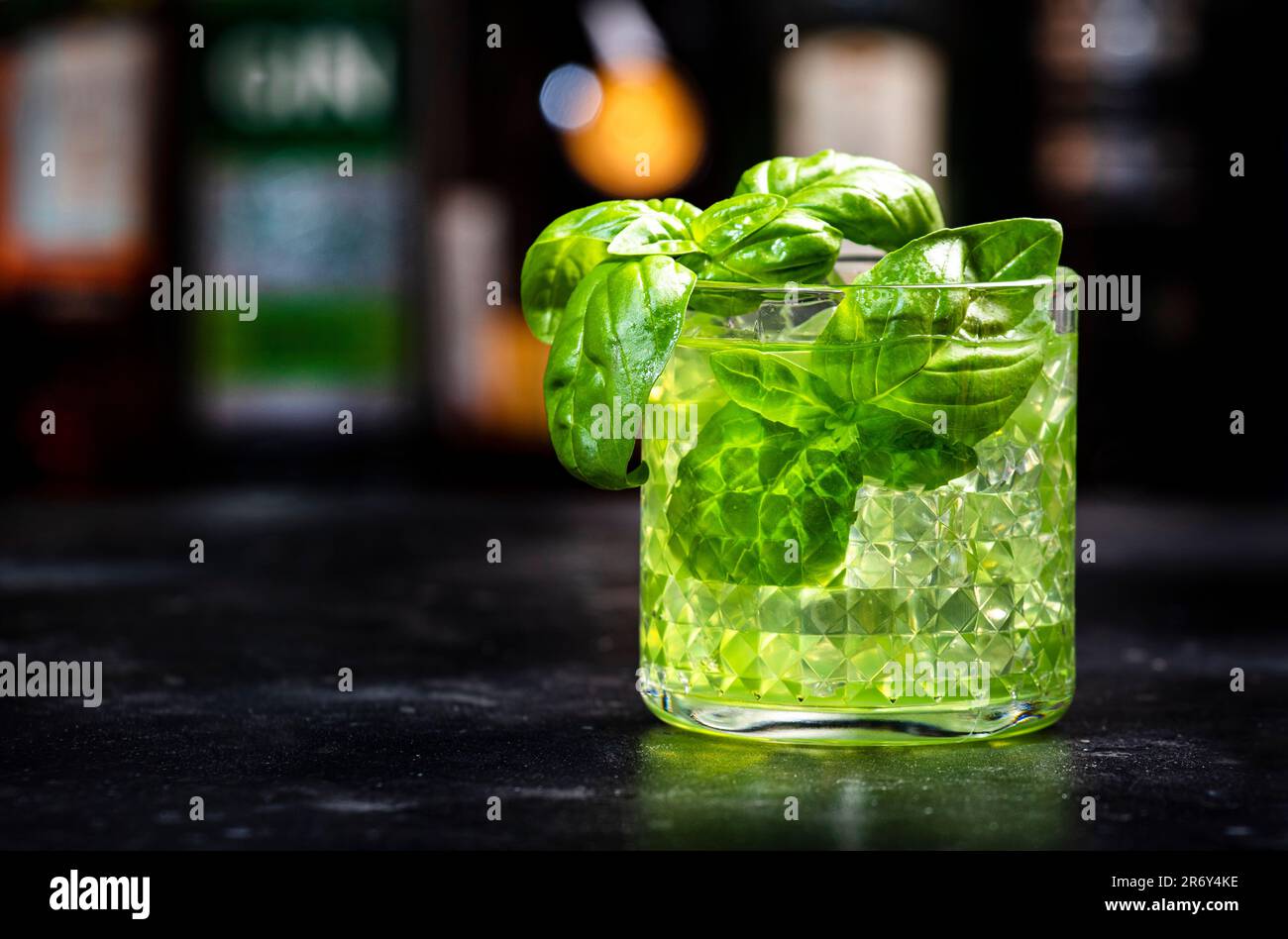 Basil smash alcoholic cocktail drink with dry gin, syrup, lemon, basil