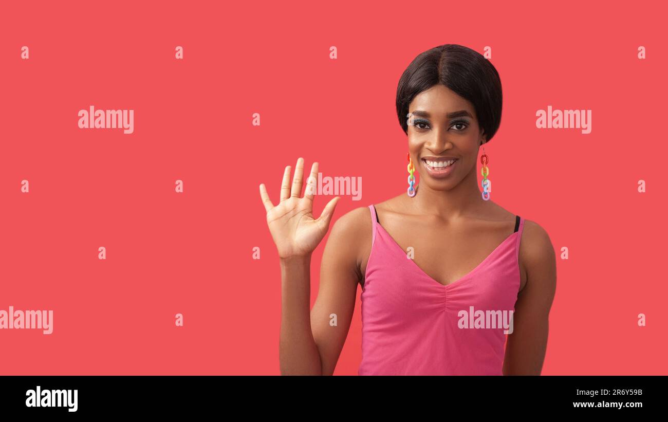 African woman waving welcoming on hi-res stock photography and images ...