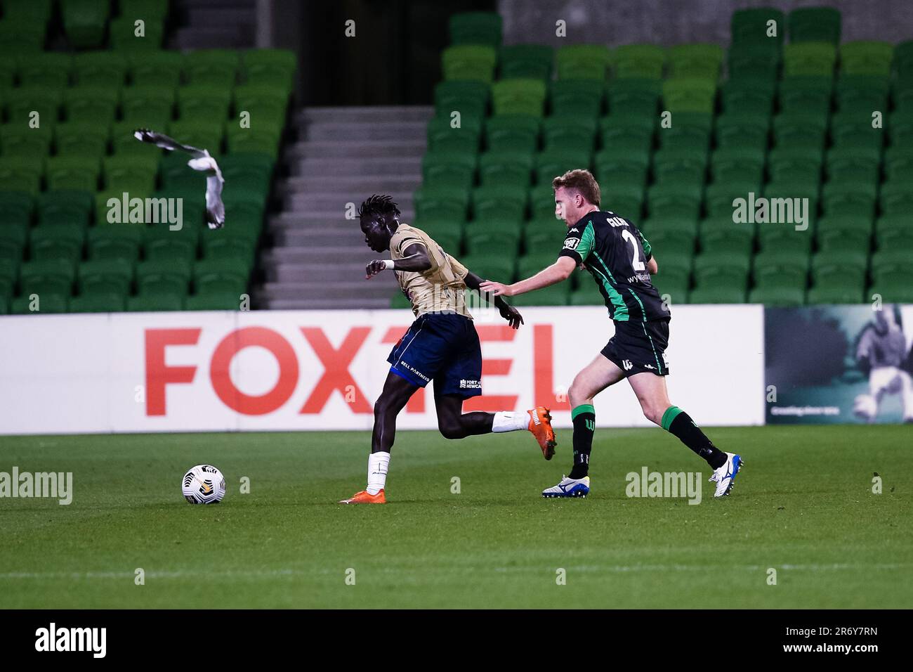 MELBOURNE, AUSTRALIA - APRIL 26: Valentino Yuel of Newcastle Jets controls the ball during the Hyundai A-League soccer match between Western United FC and Newcastle Jets on April, 26, 2021 at AAMI Park in Melbourne, Australia. Stock Photo