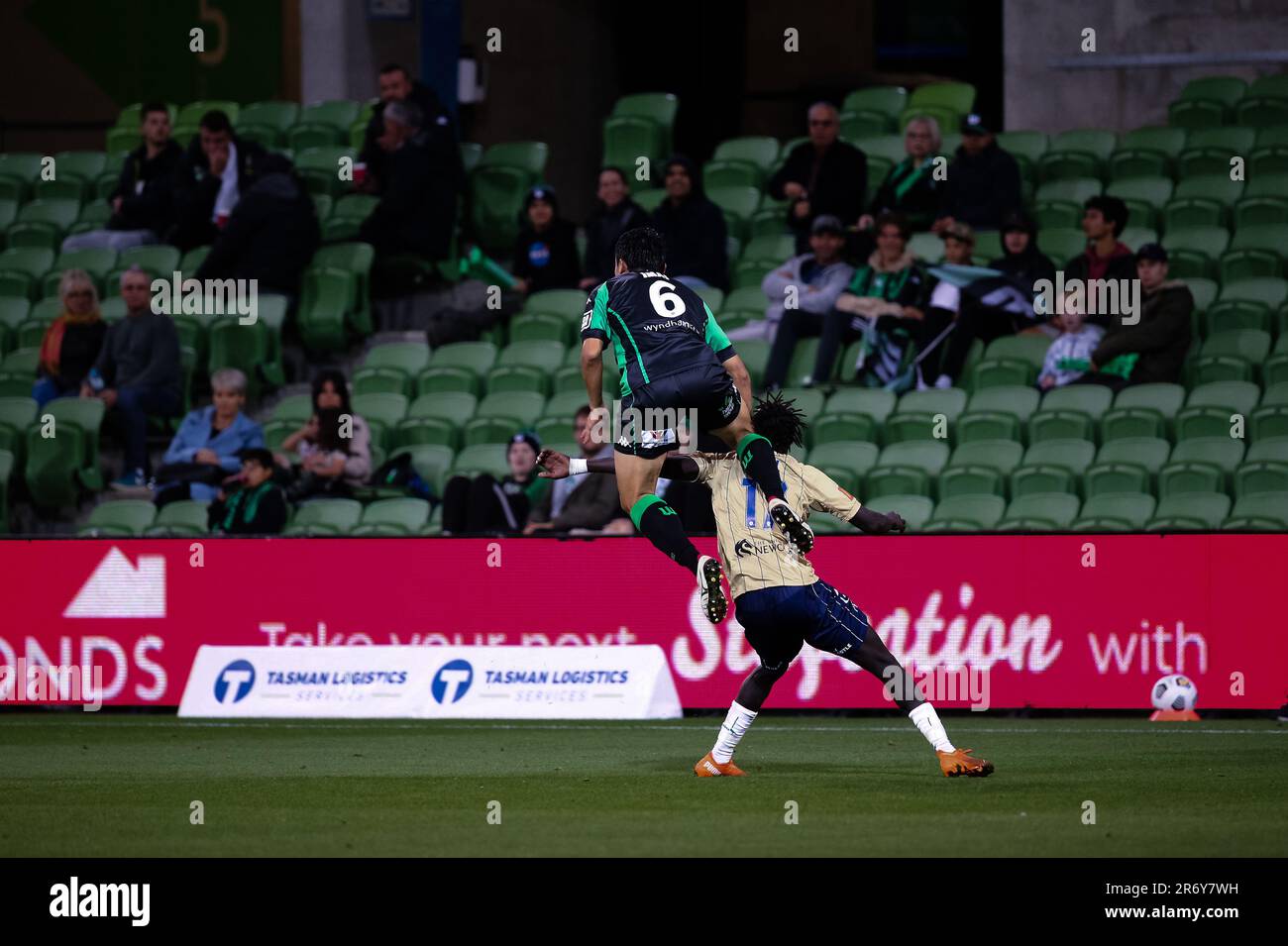 MELBOURNE, AUSTRALIA - APRIL 26: Tomoki Imai of Western United heads the ball ahead of Valentino Yuel of Newcastle Jets during the Hyundai A-League soccer match between Western United FC and Newcastle Jets on April, 26, 2021 at AAMI Park in Melbourne, Australia. Stock Photo