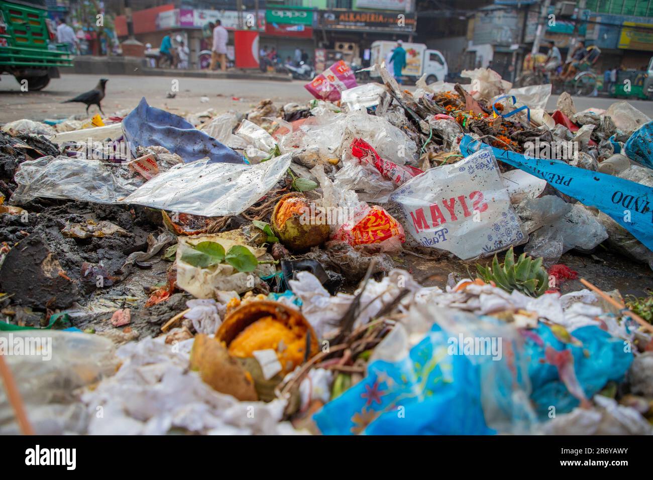 Plastic and other garbage littered of the road at Dhaka, the capital ...