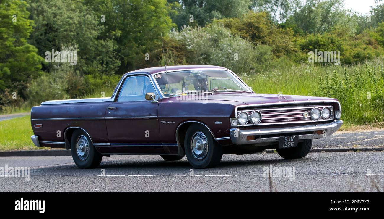 Stony Stratford,UK - June 4th 2023:  1969 maroon FORD RANCHERO 500    classic car travelling on an English country road. Stock Photo