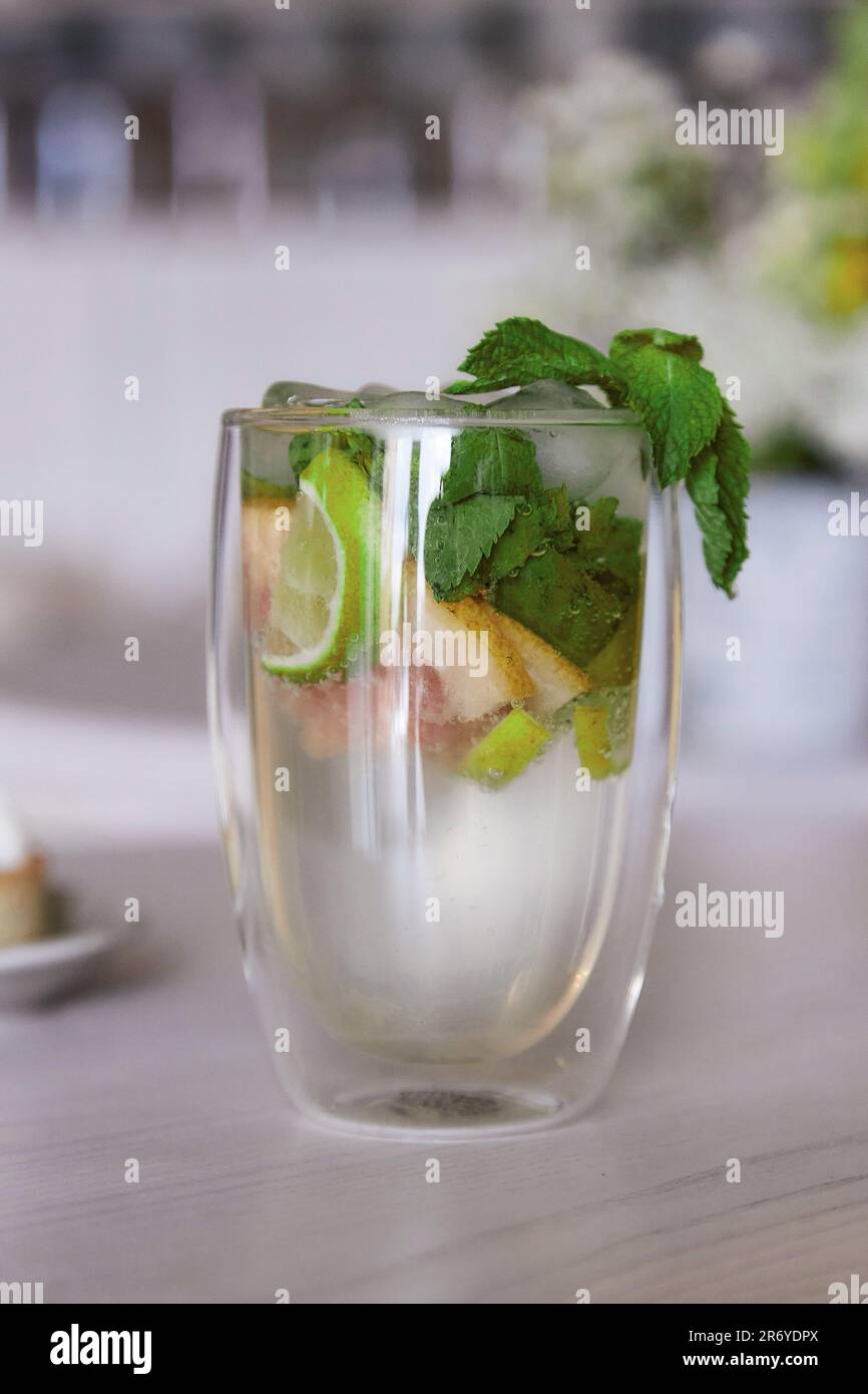 non-alcoholic mojito with fresh mint in the cafe. Summer refreshing drink. Stock Photo