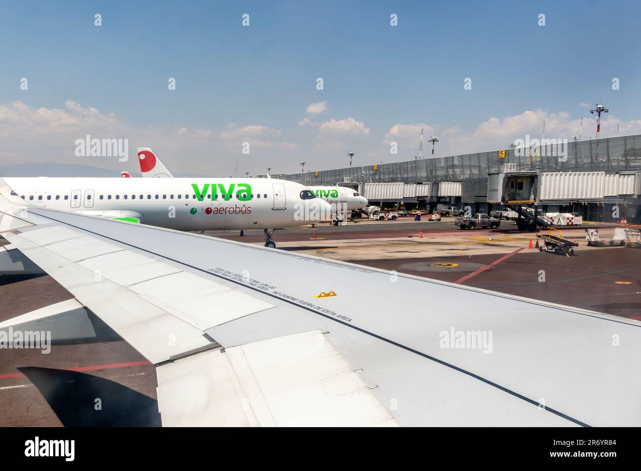 View to Viva Aerobus Airbus A320 planes Terminal 1, Benito Juarez International Airport, Mexico