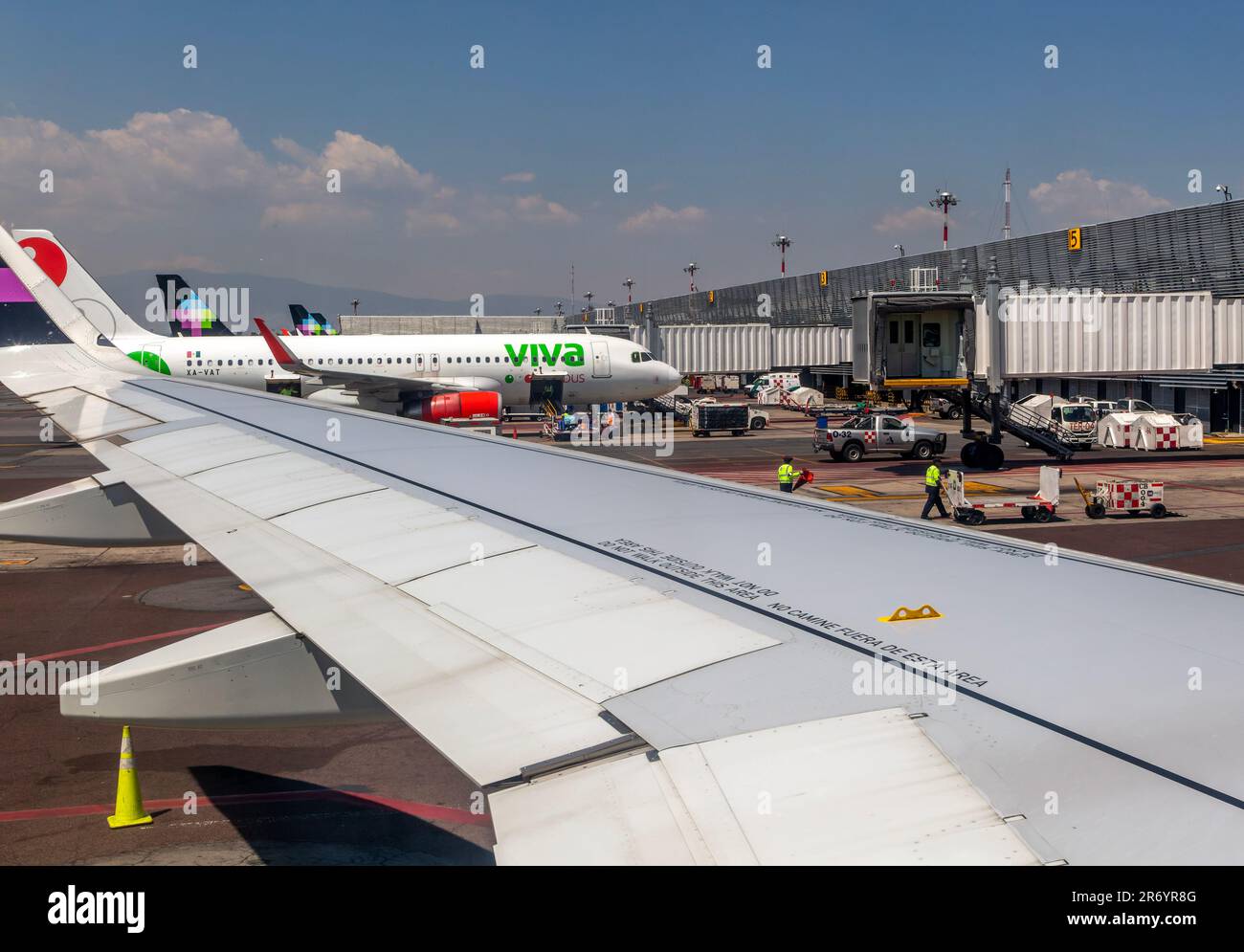 View to Viva Aerobus Airbus A320 plane Terminal 1, Benito Juarez International Airport, Mexico