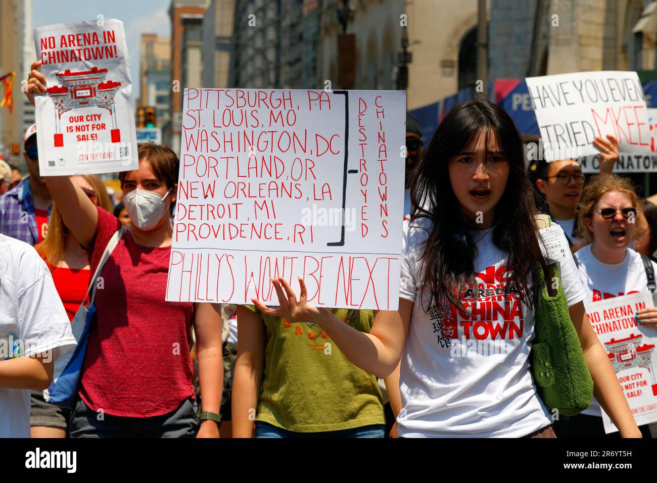 June 10, 2023, Philadelphia. No Arena in Chinatown protest march. A woman holds a list of destroyed Chinatowns in the USA (see add'l info). Stock Photo