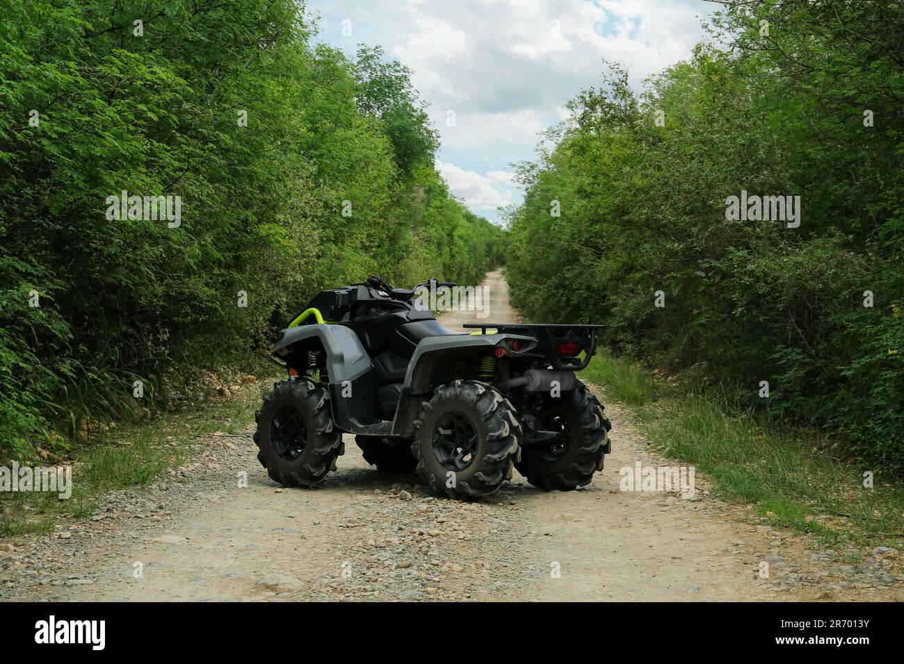 Beautiful quad bike on pathway near trees outdoors Stock Photo Alamy