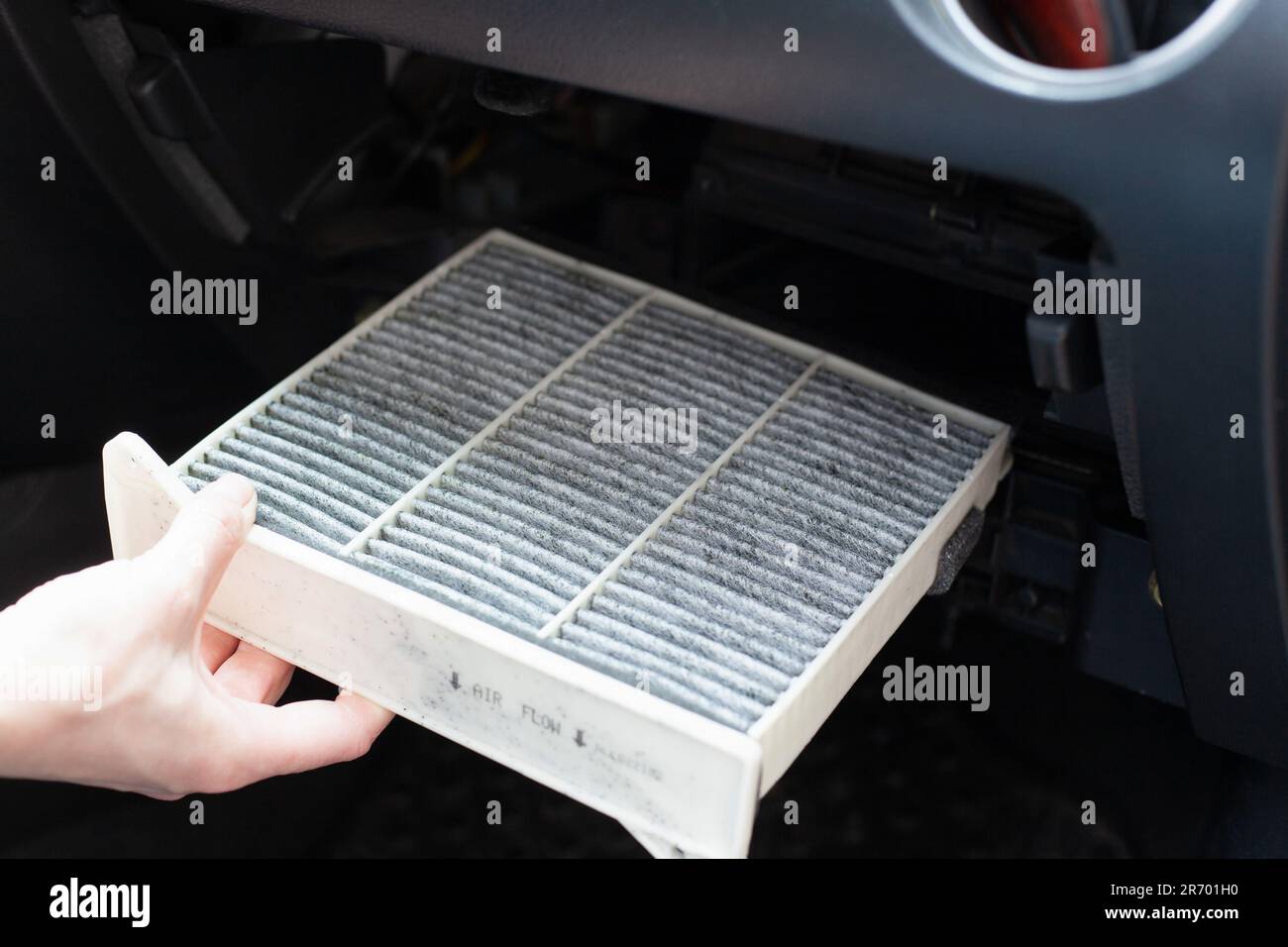 Replacing the ar cabin filter the car. Replacing New Air filter. Stock Photo