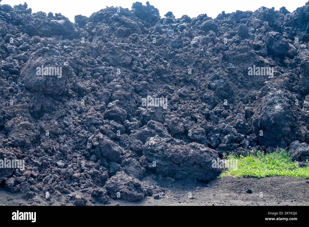 A variety of forms of basalt solidified lava (clinker, block-lava): hawaiian is main type of lava (aa-lava) erupted from mantle liquid rock (magma). S Stock Photo