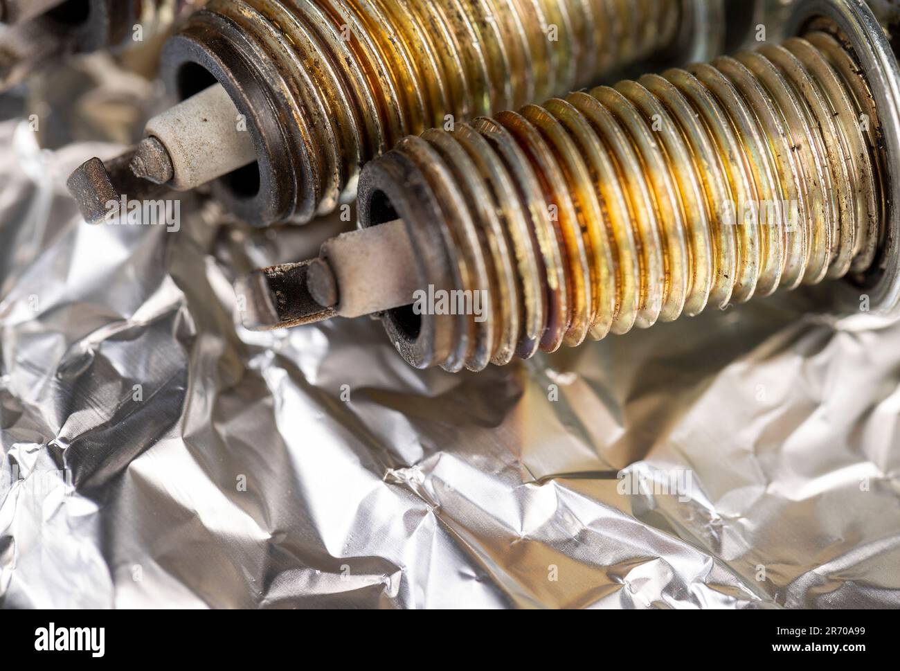 old very damaged car spark plugs, closeup of old used car spark plugs