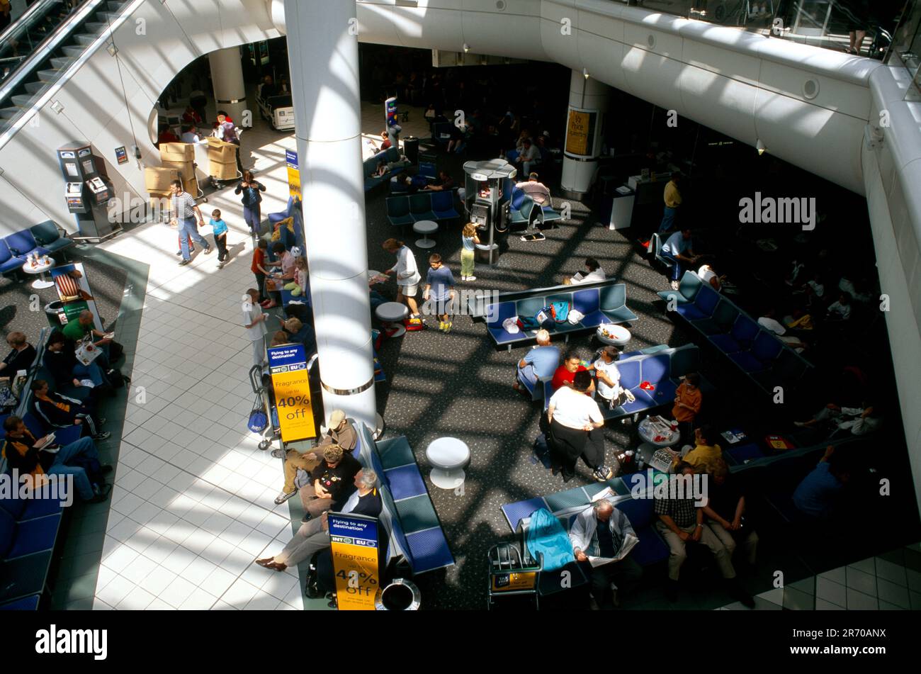 Gatwick Airport England Overview of Passengers waiting in Departure Lounge & Duty Free Shopping Stock Photo