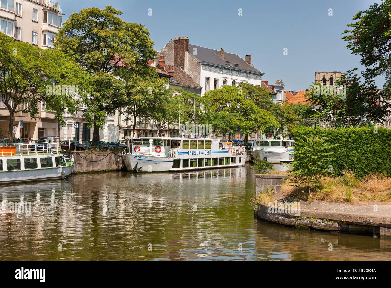 Ghent, Belgium - July 10, 2010 : Ketelpoort, boat hire and boat tour depot at intersection of two canals. Stock Photo