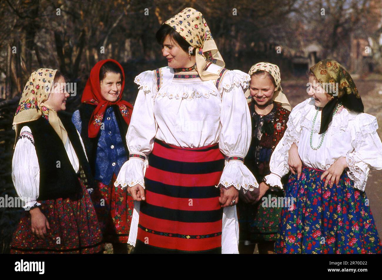 Woman and girls wearing traditional handmade costumes in Maramures,  Romania, in the 1970s Stock Photo - Alamy