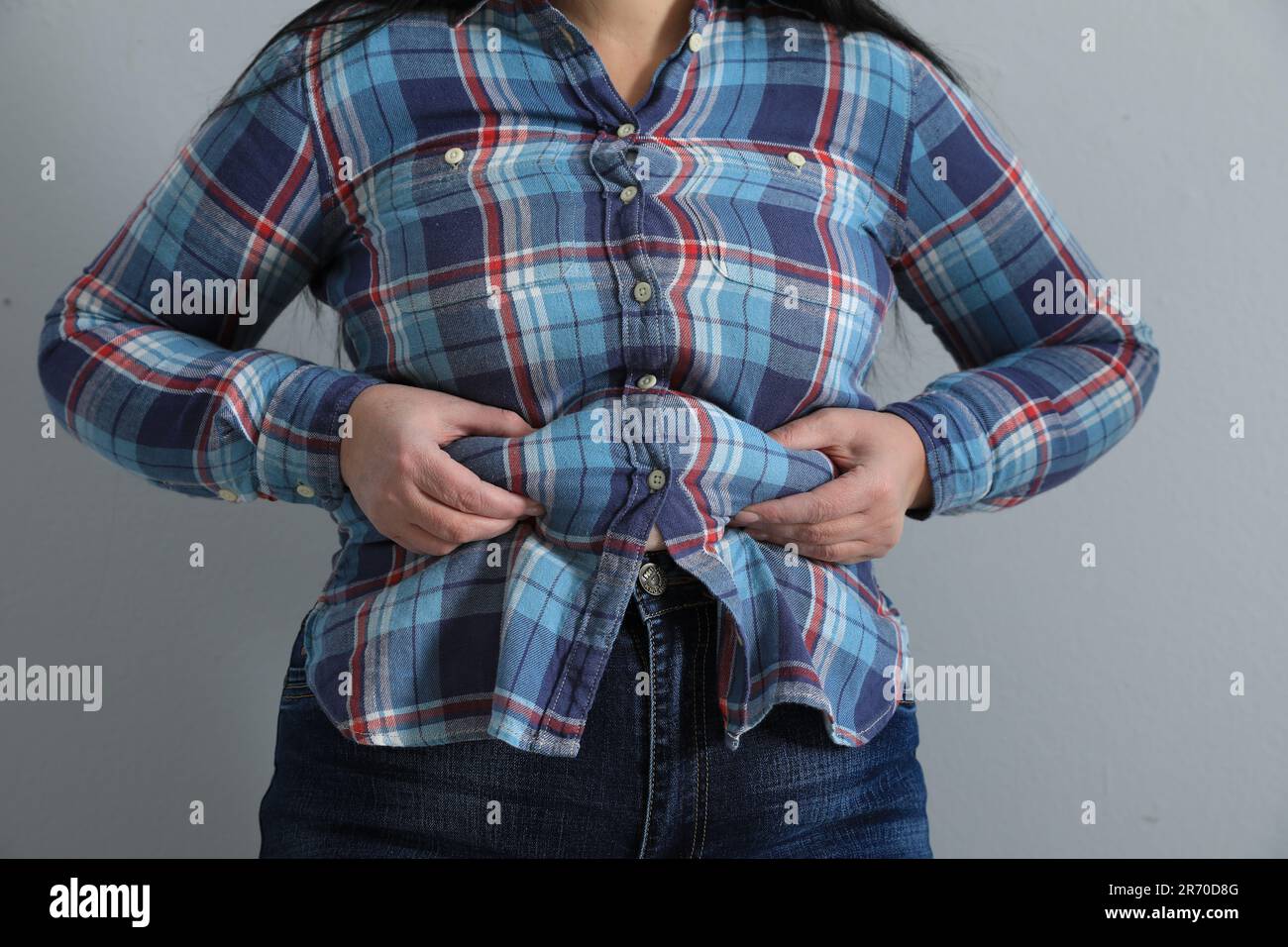 Woman wearing tight blue jeans hi-res stock photography and images - Alamy