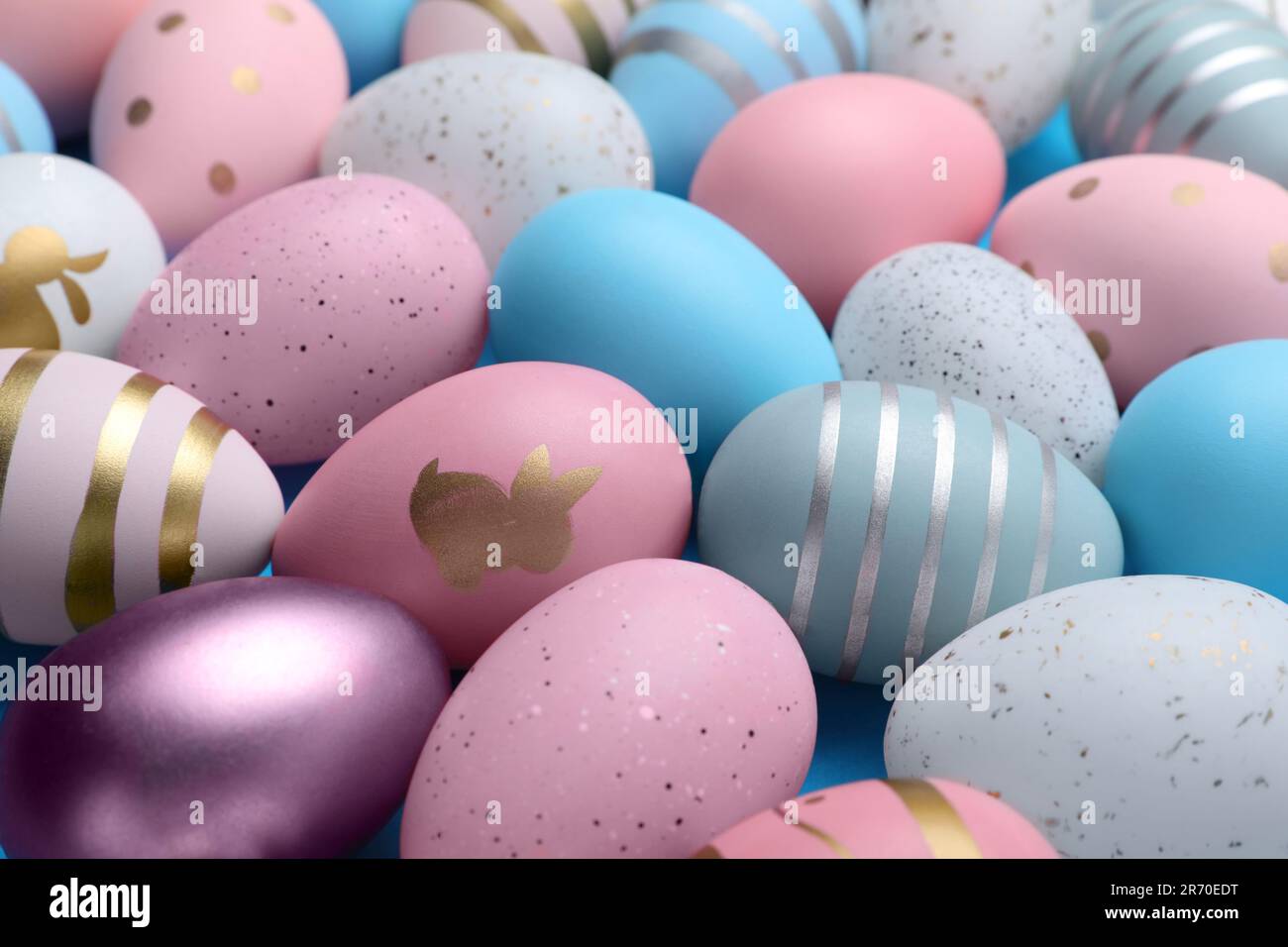 Many painted Easter eggs as background, closeup Stock Photo