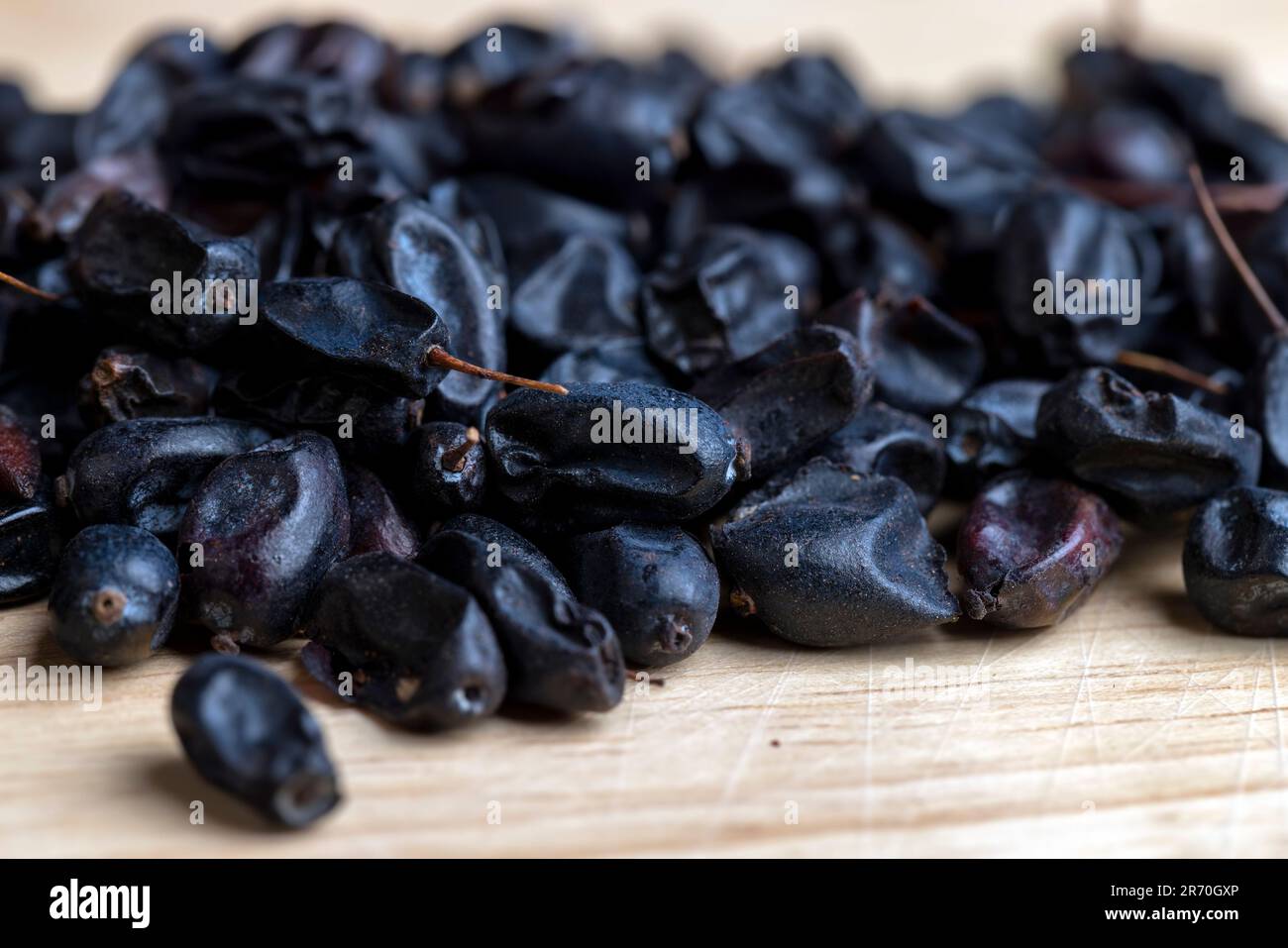 Black spices of dried barberry for cooking meat, dried barberry spice for cooking meat oriental dishes Stock Photo