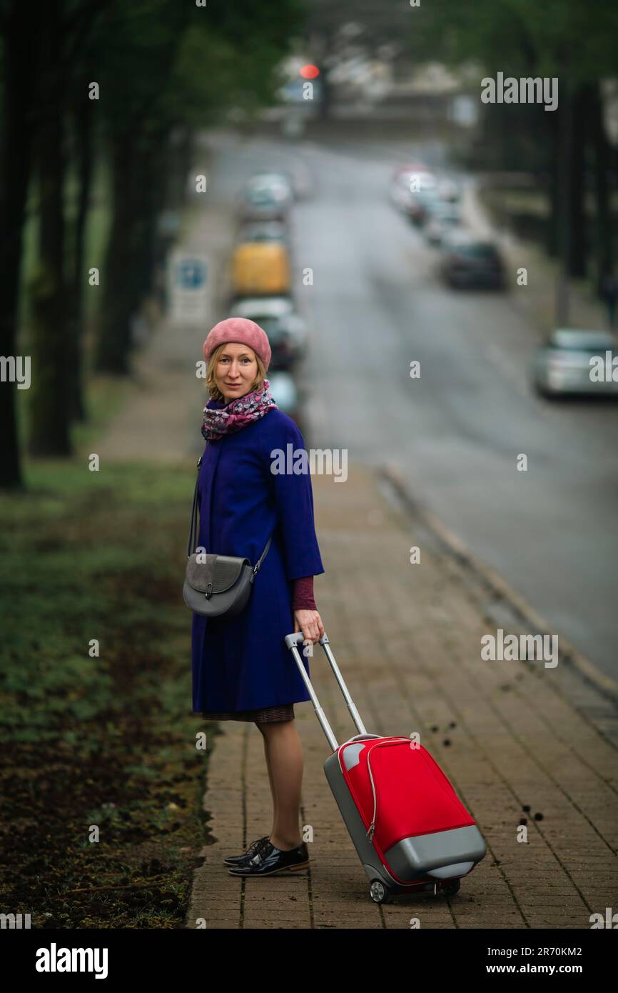 Elegant young woman walks hi-res stock photography and images - Alamy