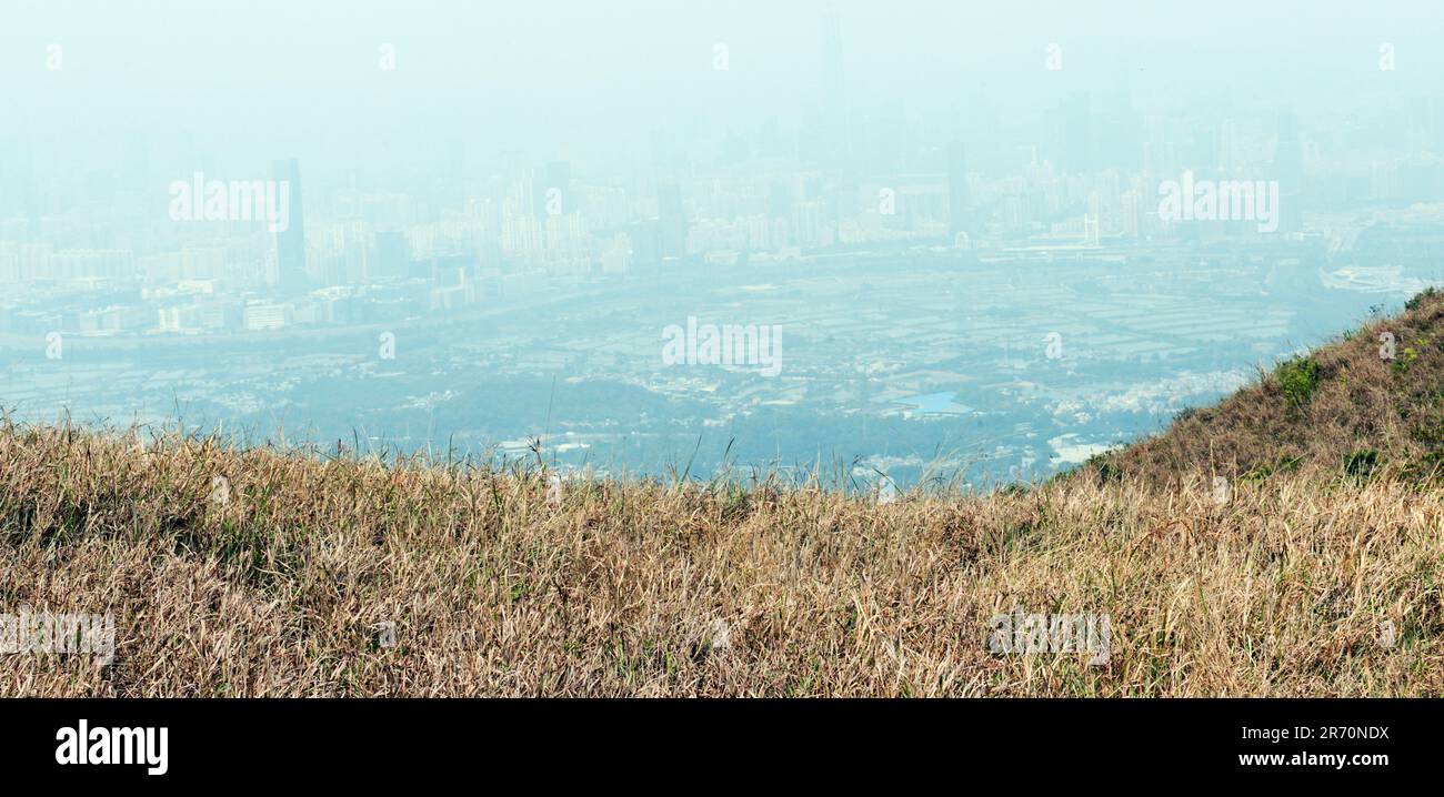 A view of Shenzhen from Kai Kung Shan mountain in the New Territories in Hong Kong. Stock Photo