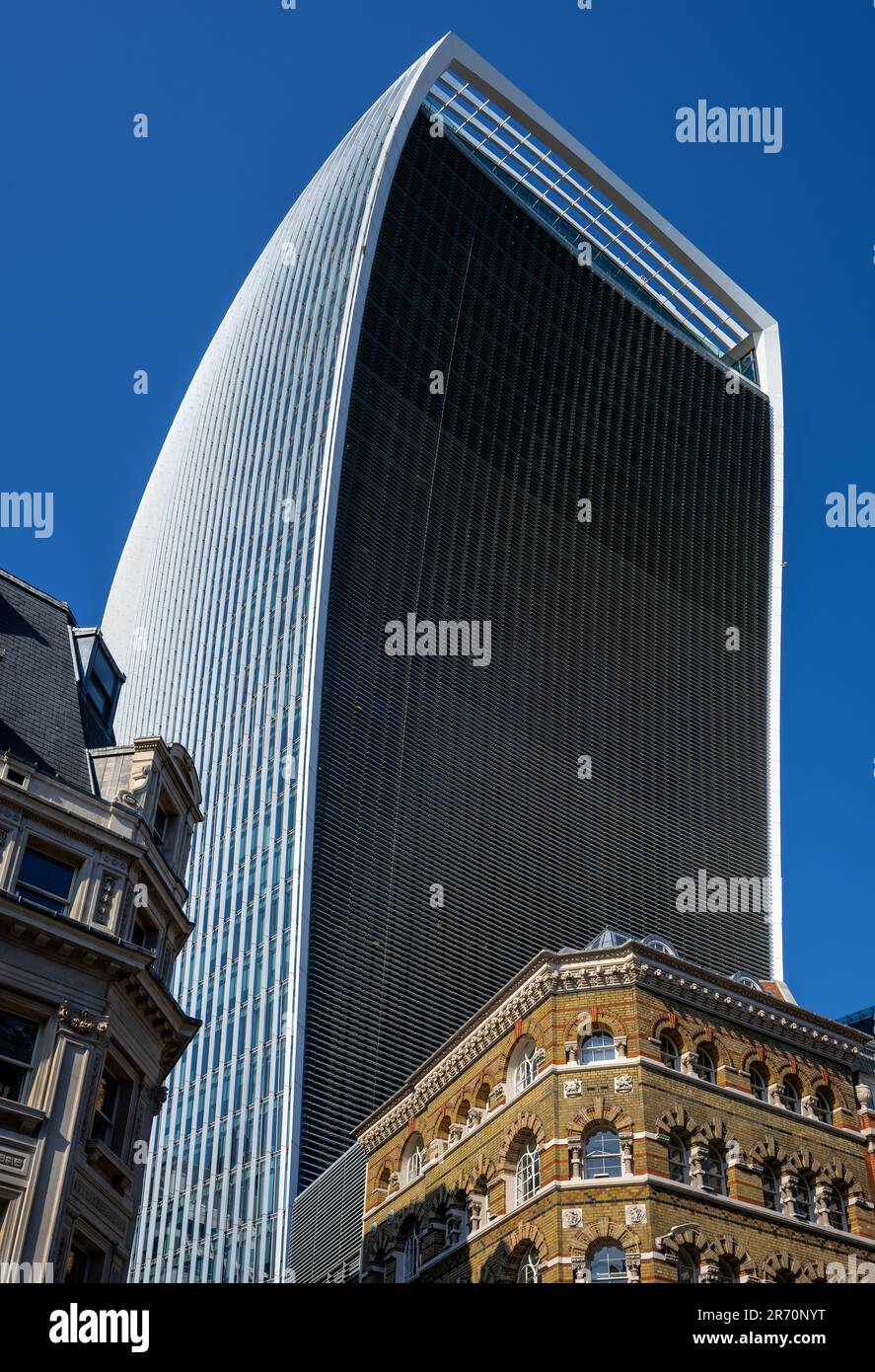 London, UK: The Walkie-Talkie or Fenchurch Building at 20 Fenchurch Street towers over the older buildings below. Seen from Eastcheap. Stock Photo