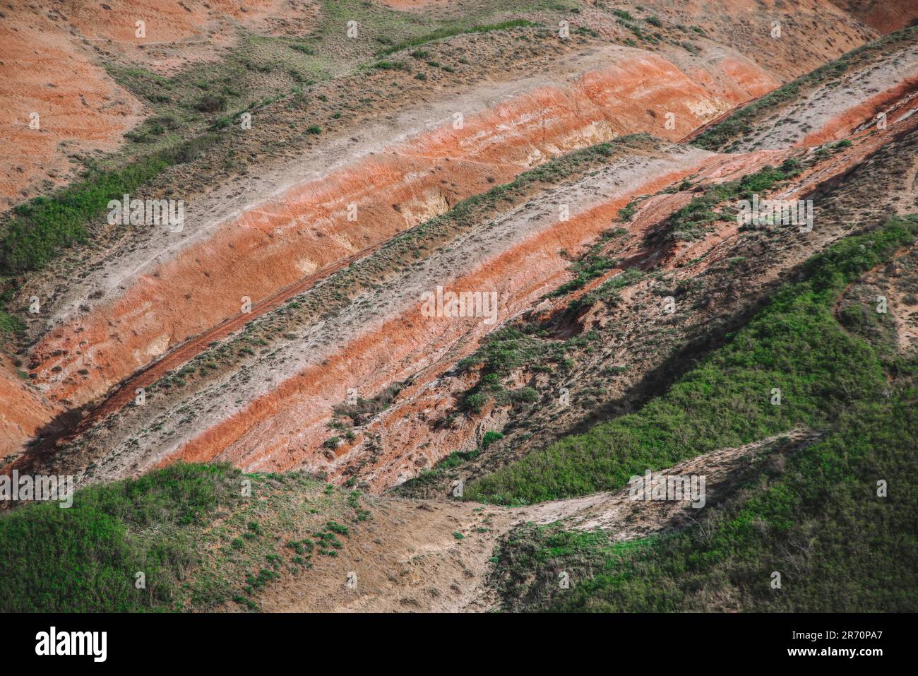 Red painted hills landscape view Stock Photo