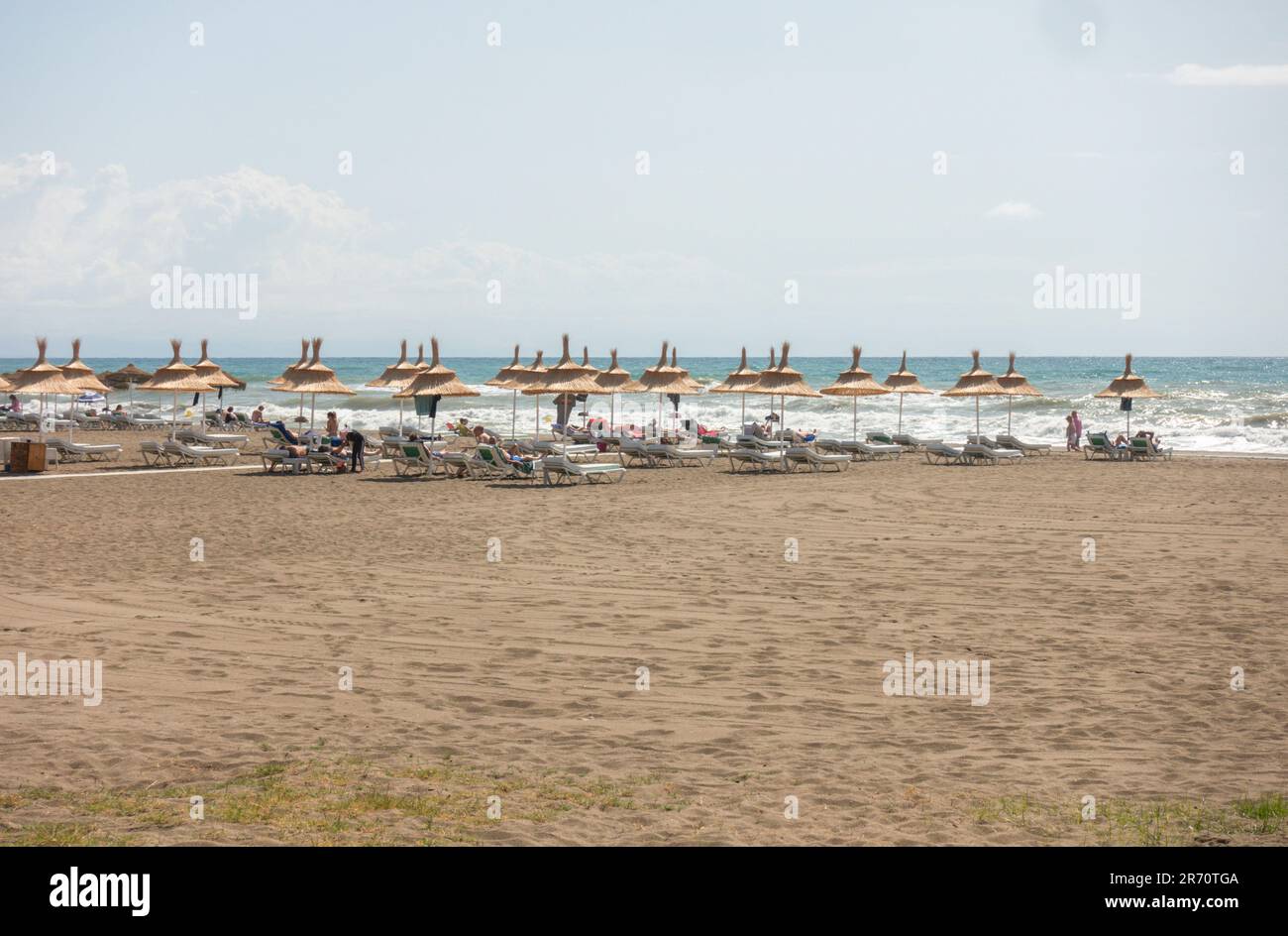 Beach resort with beach beds and parasols, La Carihuela, Torremolinos