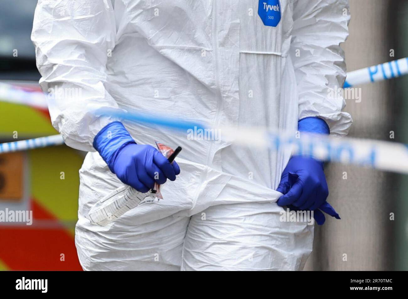 A police forensics officer at a property on James Street in Ballymena, Co Antrim, following the launch of a murder inquiry on Sunday after suspected human remains were found during the search for Chloe Mitchell, who was last seen on CCTV in the early hours of June 3 in Ballymena town centre. Brandon John Rainey, 26, of James Street in Ballymena appeared via video link at Ballymena Magistrates' Court, charged with the murder of 21-year-old Chloe. Picture date: Monday June 12, 2023. Stock Photo