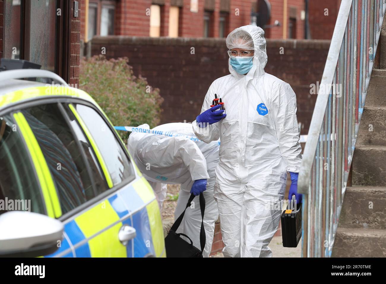 Police forensics officers at a property on James Street in Ballymena, Co Antrim, following the launch of a murder inquiry on Sunday after suspected human remains were found during the search for Chloe Mitchell, who was last seen on CCTV in the early hours of June 3 in Ballymena town centre. Brandon John Rainey, 26, of James Street in Ballymena appeared via video link at Ballymena Magistrates' Court, charged with the murder of 21-year-old Chloe. Picture date: Monday June 12, 2023. Stock Photo